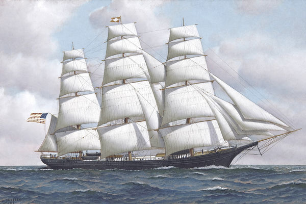 A three-masted clipper ship under full sail on a choppy sea, flying an American flag, against a partly cloudy sky.