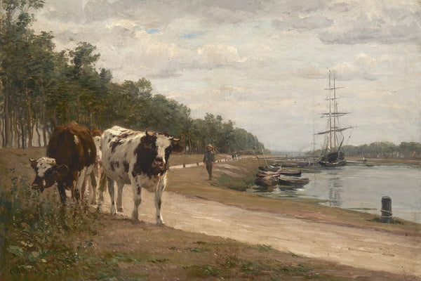Cattle and a herder walking along a riverside towpath with moored sailing ships in the background under an overcast sky.